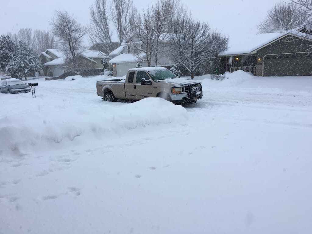 Truck parked in deep snow