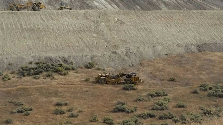construction equipment working in a field