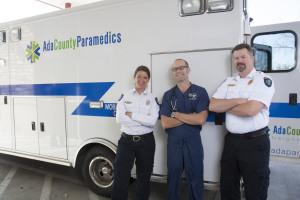 Ada County Paramedics standing next to an Ambulance