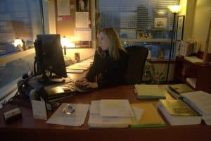 Jan M. Bennetts works at her desk