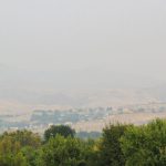 foothills shrouded in smoke